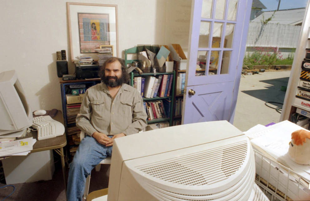 Jim next to his computer